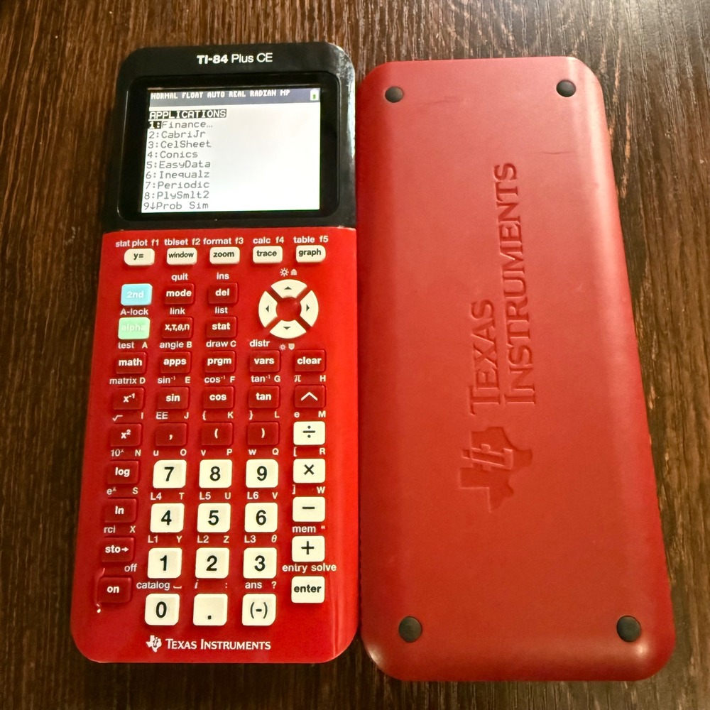 Texas Instruments TI-84 Plus CE Graphing Calculator Red Python + Charger Cable